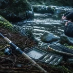 La peche truite en rivière au petit matin